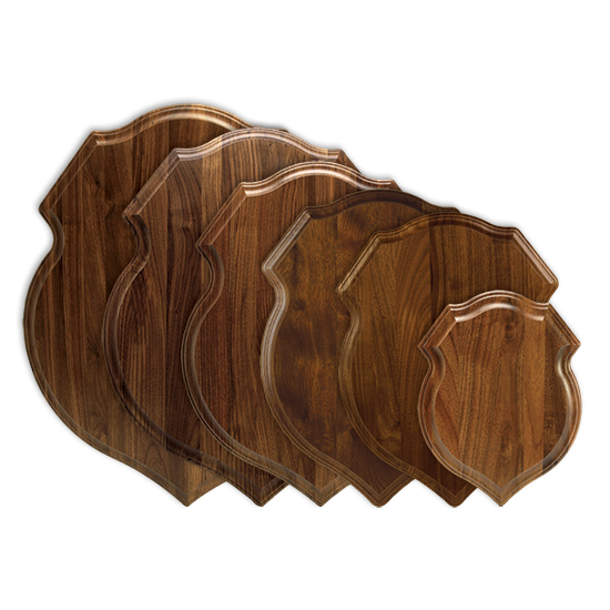 Solid walnut, crest-shaped plaque for taxidermy mounts.